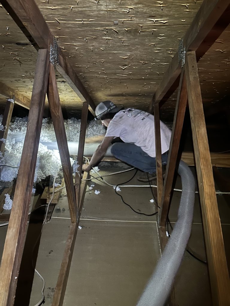 blown fiberglass insulation in the attic 